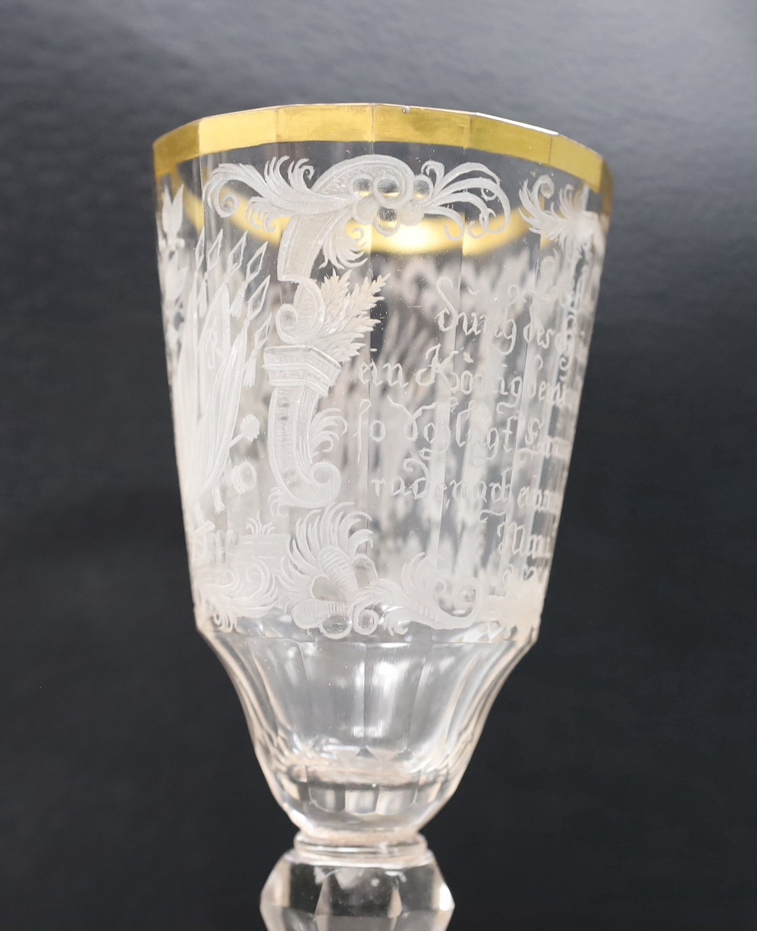 A mid 18th century German/Bohemian glass with military engraving, 17cms high